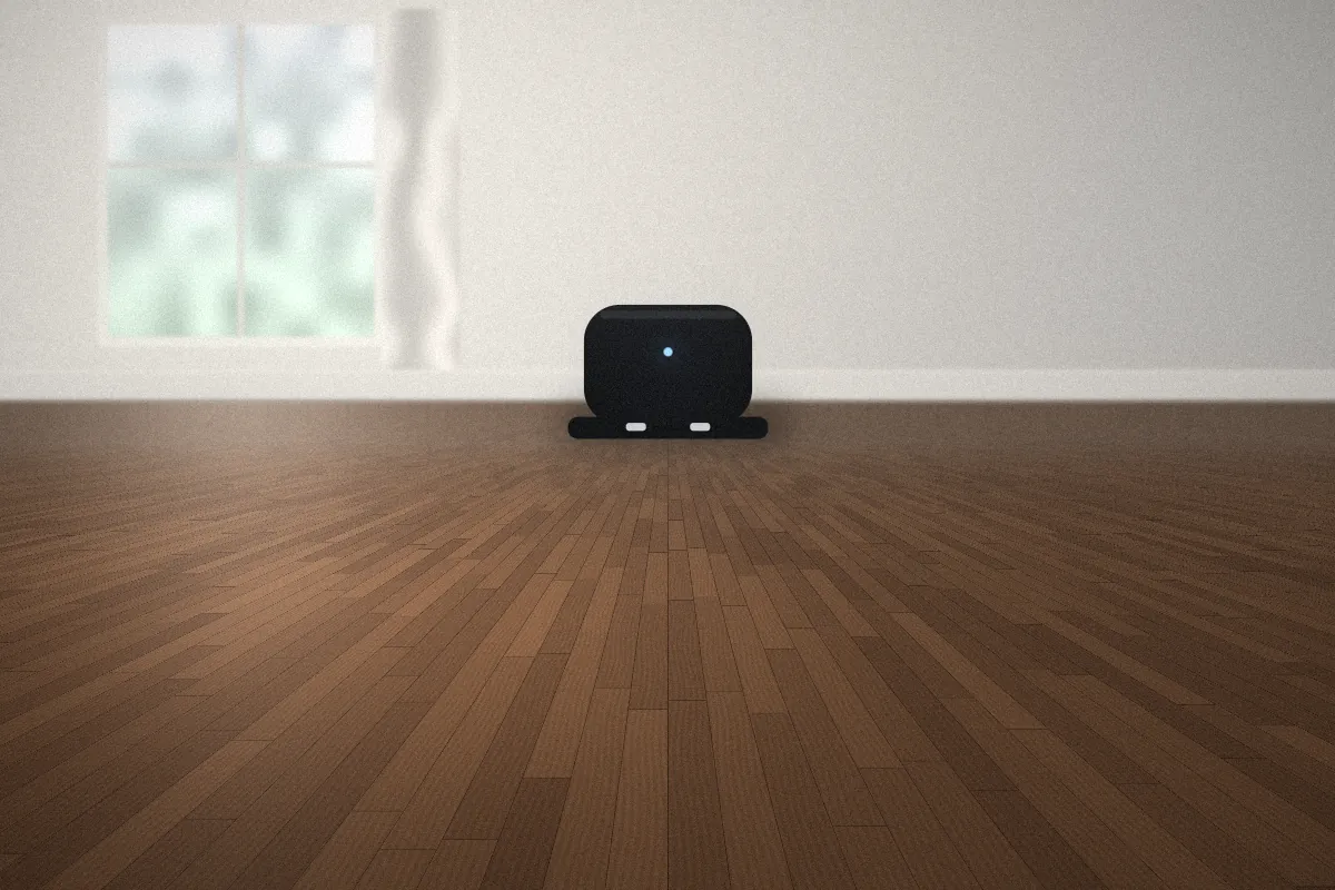 Charging dock placed against a wall with open floor space around it